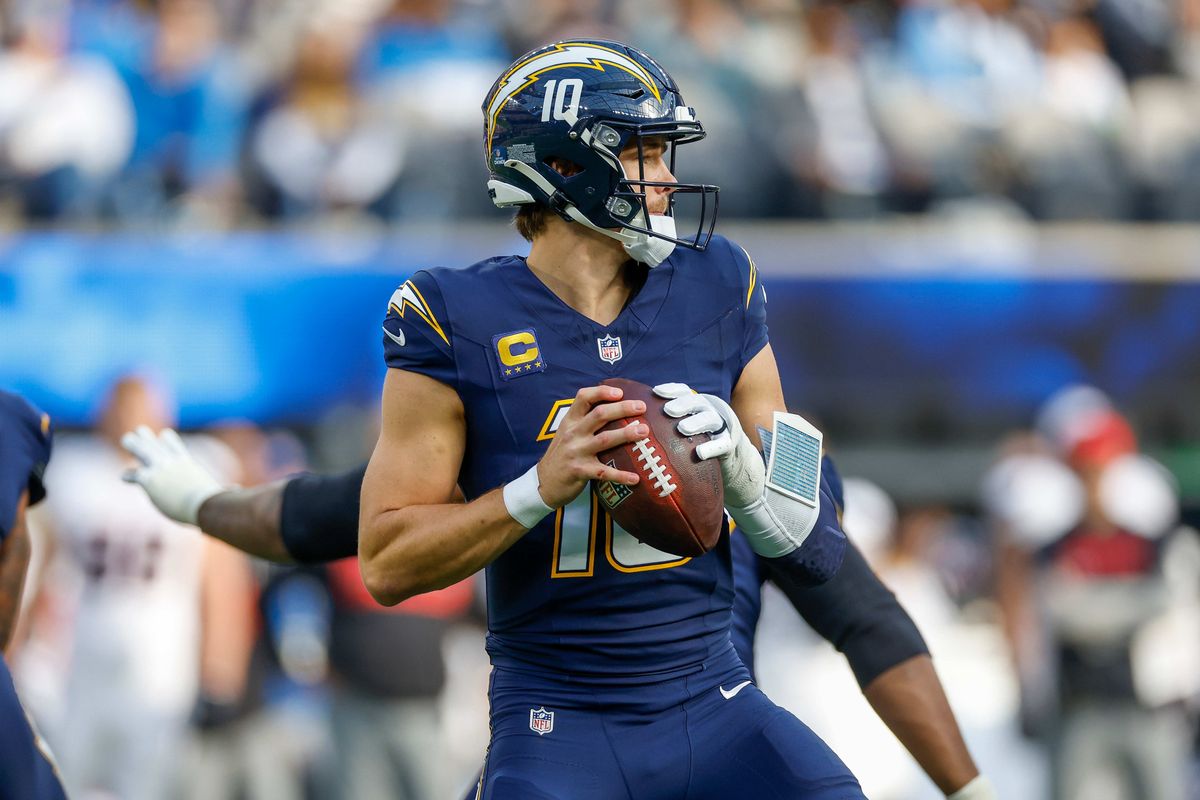 Los Angeles Chargers quarterback Justin Herbert (10) runs the ball for a gain during a NFL game against the Houston Texans on December 027, 2025 at Sofi Stadium in Inglewood, CA.