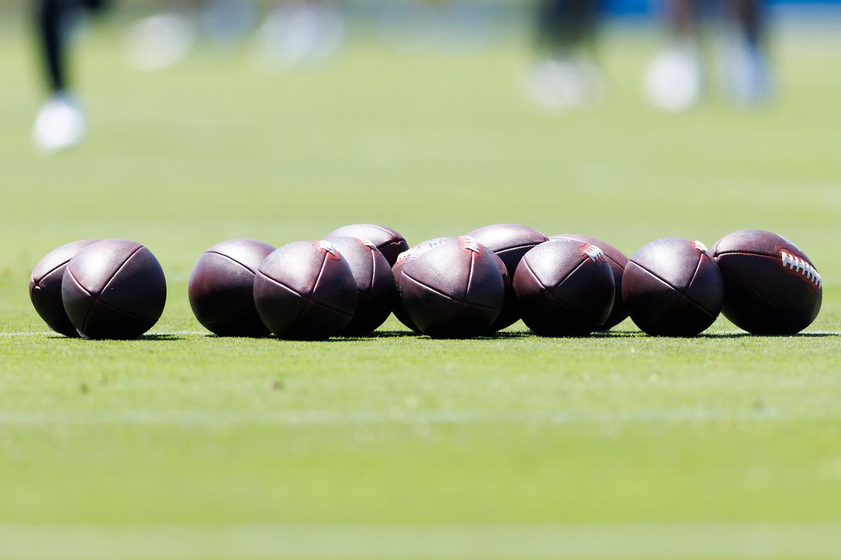 A detail view of footballs on the field during offseason workout at The Bolt on May 19, 2026 in El Segundo, California. 