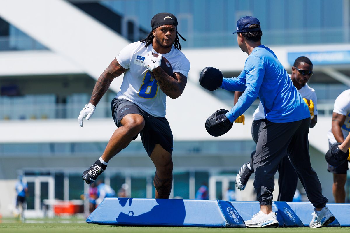 Omarion Hampton #8 of the Los Angeles Chargers runs with the ball during offseason workout at The Bolt on May 19, 2026 in El Segundo, California. 