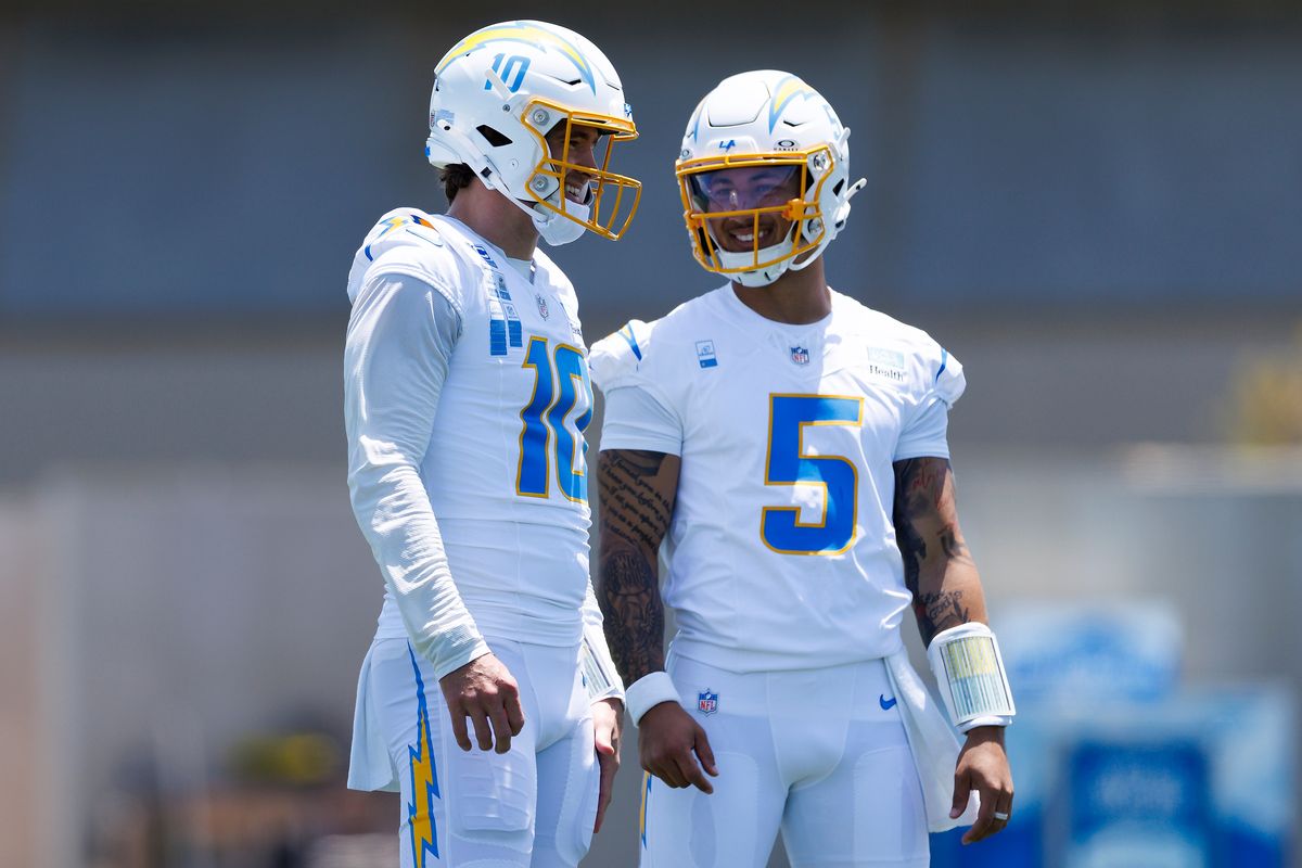 Justin Herbert #10 of the Los Angeles Chargers laughs with Trey Lance #5 of the Los Angeles Chargers during organized team activities workout at The Bolt on May 27, 2026 in El Segundo, California. Justin Herbert #10 of the Los Angeles Chargers laughs with Trey Lance #5 of the Los Angeles Chargers during organized team activities workout at The Bolt on May 27, 2026 in El Segundo, California.