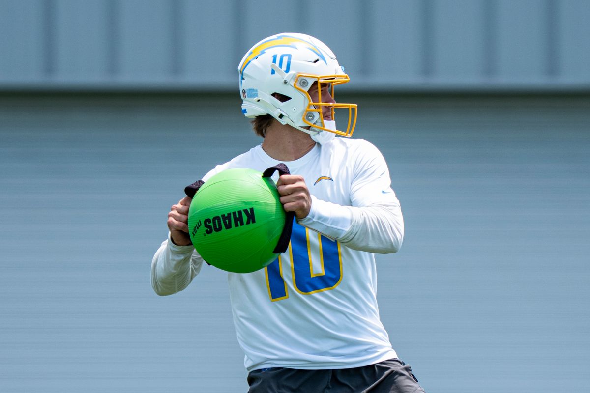 Los Angeles Chargers quarterback Justin Herbert (10) engages in quarterback drills during Chargers organized team activities at the Bolt on Tuesday, June 2nd in El Segundo, CA. Los Angeles Chargers quarterback Justin Herbert (10) engages in quarterback drills during Chargers organized team activities at the Bolt on Tuesday, June 2nd in El Segundo, CA.