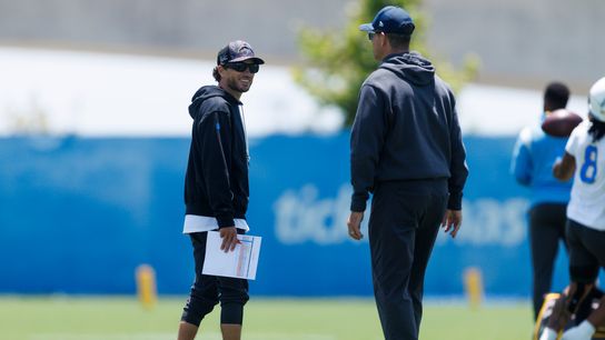 Mike McDaniels and Jim Harbaugh of the Los Angeles Chargers talk during offseason organized team activities at The Bolt on May 26, 2026 in El Segundo, California. Mike McDaniels and Jim Harbaugh of the Los Angeles Chargers talk during offseason organized team activities at The Bolt on May 26, 2026 in El Segundo, California.