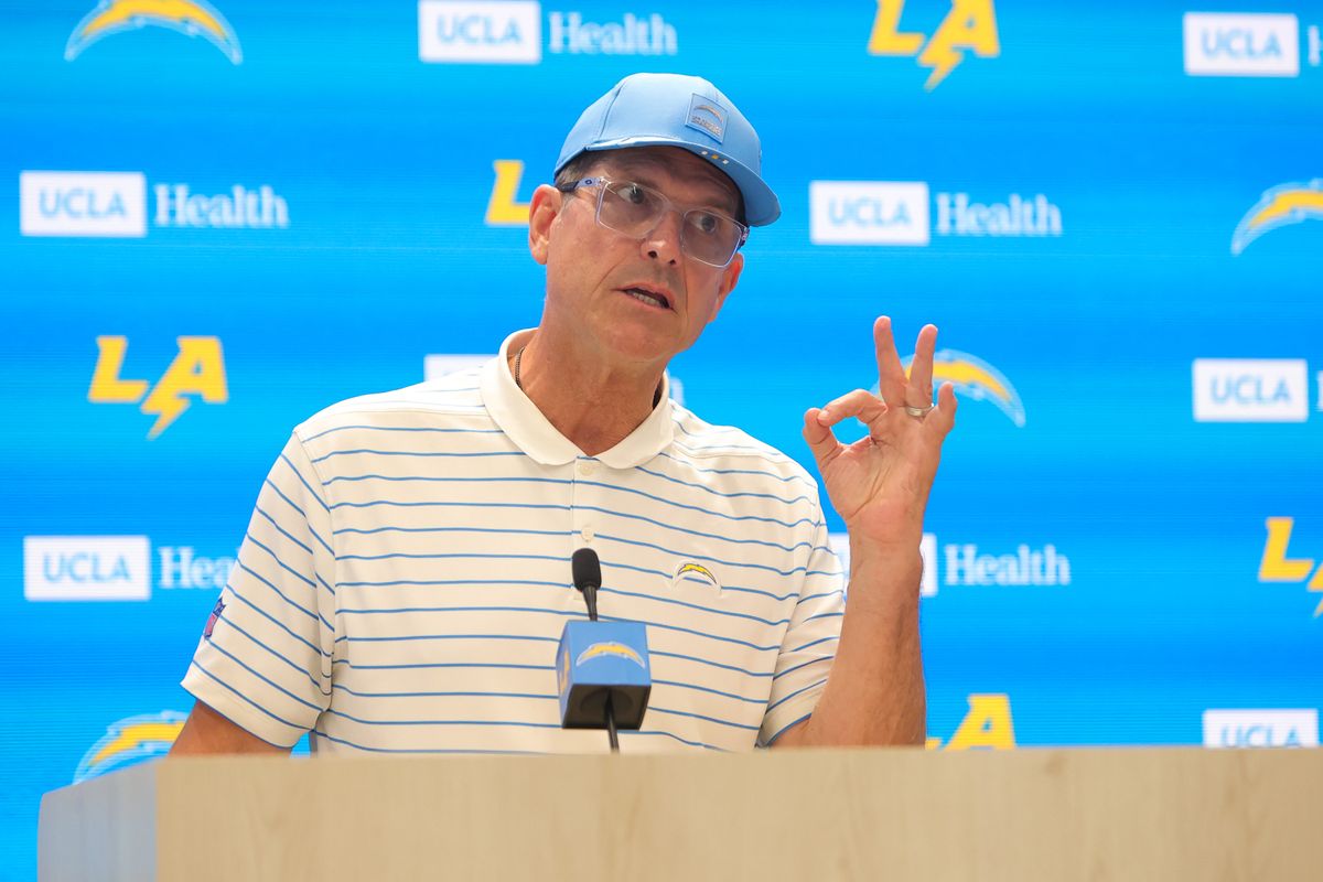 Jim Harbaugh of the Los Angeles Chargers speaks with members of the media before mandatory minicamp at The Bolt on June 18, 2026 in El Segundo, California. Jim Harbaugh of the Los Angeles Chargers speaks with members of the media before mandatory minicamp at The Bolt on June 18, 2026 in El Segundo, California.