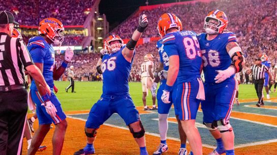 Nov 29, 2025; Gainesville, Florida, USA; Florida Gators center Jake Slaughter (66) celebrates a touchdown during the third quarter against the Florida State Seminoles at Ben Hill Griffin Stadium. 