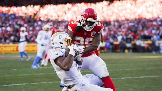 Dec 14, 2025; Kansas City, Missouri, USA; Los Angeles Chargers running back Omarion Hampton (8) intercepts a pass intended for Kansas City Chiefs running back Kareem Hunt (29) during the fourth quarter at GEHA Field at Arrowhead Stadium. Dec 14, 2025; Kansas City, Missouri, USA; Los Angeles Chargers running back Omarion Hampton (8) intercepts a pass intended for Kansas City Chiefs running back Kareem Hunt (29) during the fourth quarter at GEHA Field at Arrowhead Stadium.