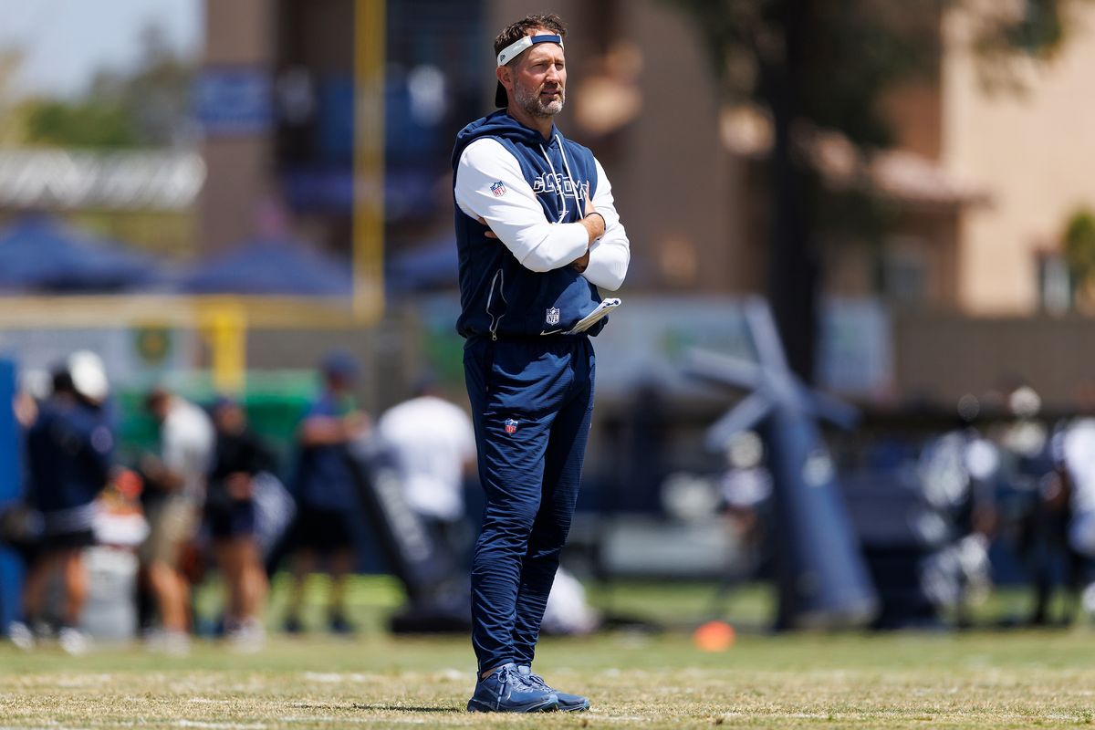 Brian Schottenheimer of the Dallas Cowboys on the field during training camp at River Ridge Playing Fields on August 4, 2026 in Oxnard, California. Brian Schottenheimer of the Dallas Cowboys on the field during training camp at River Ridge Playing Fields on August 4, 2026 in Oxnard, California.