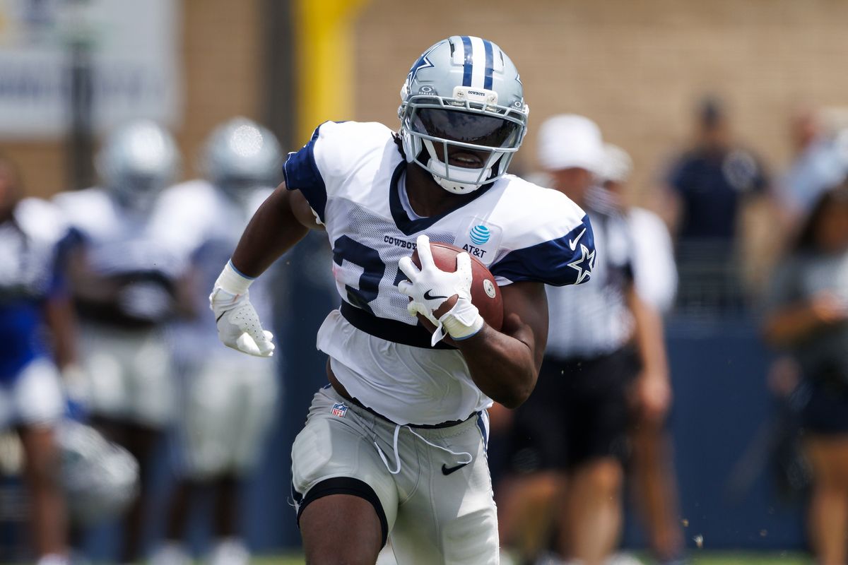 Javonte Williams #33 of the Dallas Cowboys runs with the ball during training camp at River Ridge Playing Fields on August 4, 2026 in Oxnard, California. Javonte Williams #33 of the Dallas Cowboys runs with the ball during training camp at River Ridge Playing Fields on August 4, 2026 in Oxnard, California.