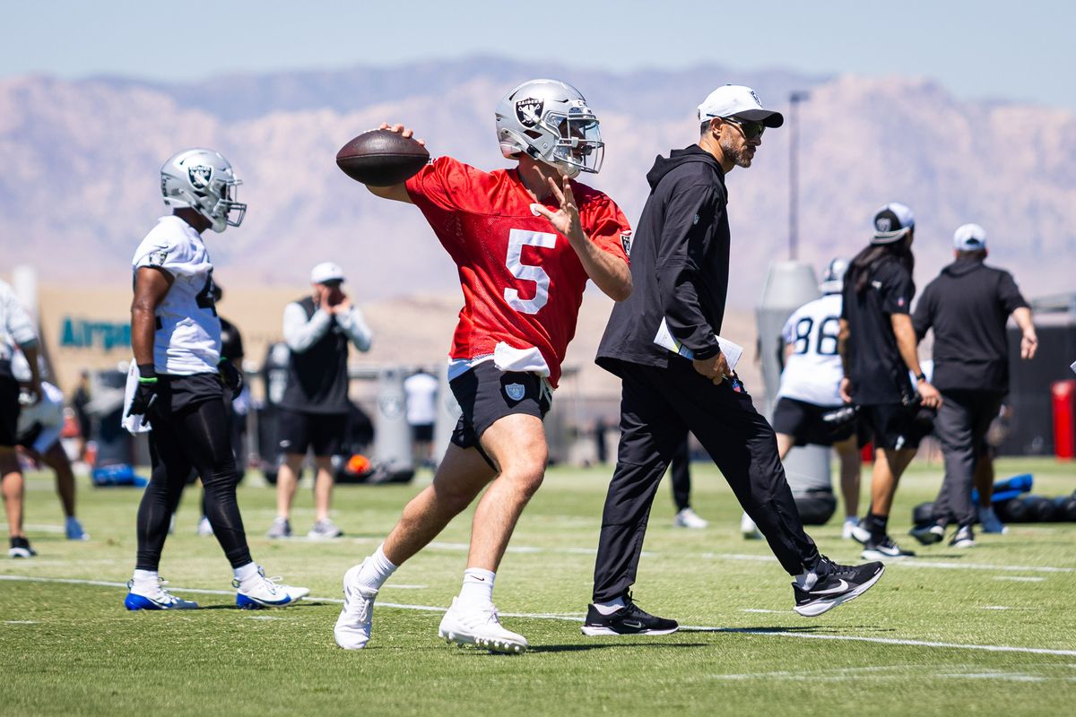 Las Vegas Raiders quarterback Cam Miller (5) throws the ball in a quarterback drill during the Raiders’ rookie mini camp, Friday May 9, 2025 in Las Vegas, Nev.