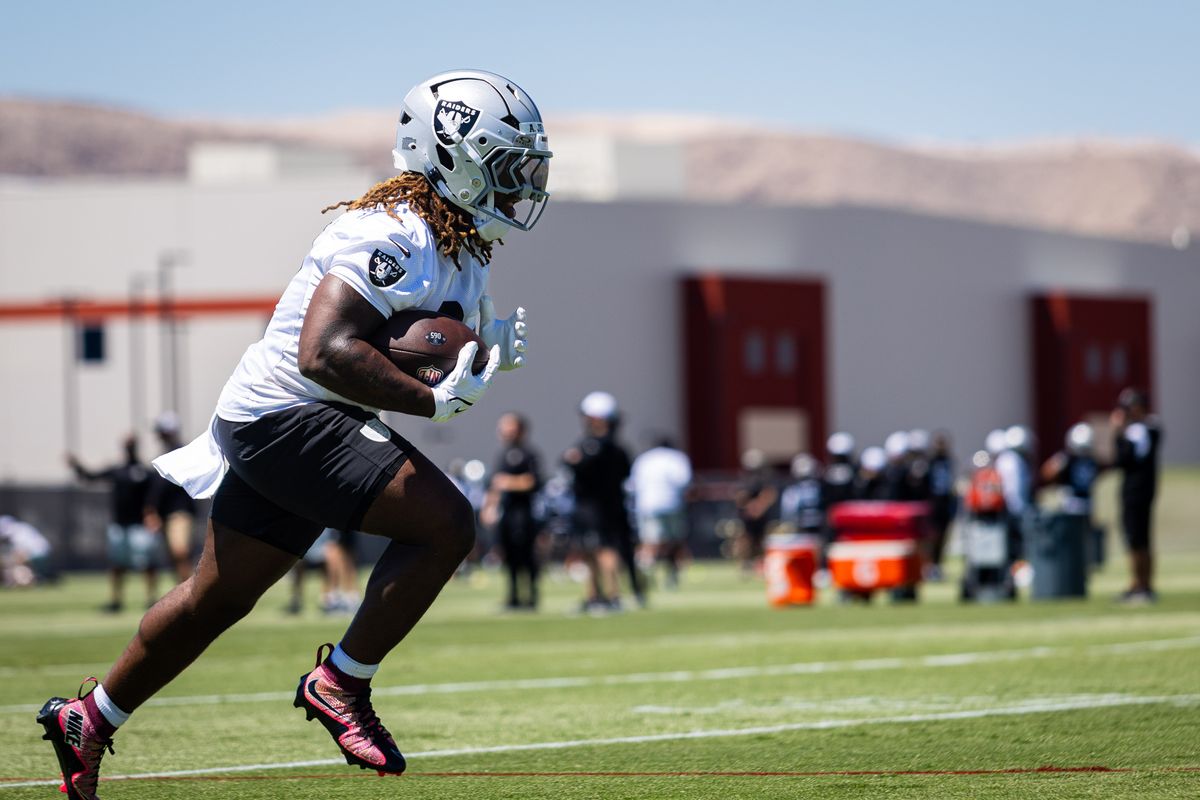 Las Vegas Raiders running back Ashton Jeanty (2) runs the ball in a running backs drill during the Raiders’ rookie mini camp, Friday May 9, 2025 in Las Vegas, Nev.