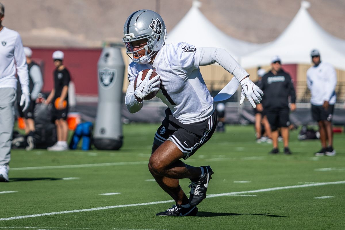  Las Vegas Raiders wide receiver Tre Tucker (1) runs with the ball in a punt returning drill during the Raiders Training Camp, Wednesday July 23, 2025 in Las Vegas, Nev. 