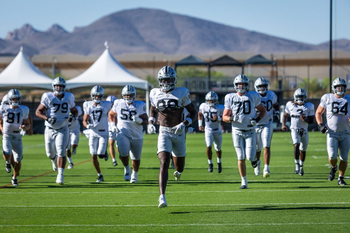  Las Vegas Raiders warm up before the Raiders Training Camp, Monday July 28, 2025 in Las Vegas, Nev. 