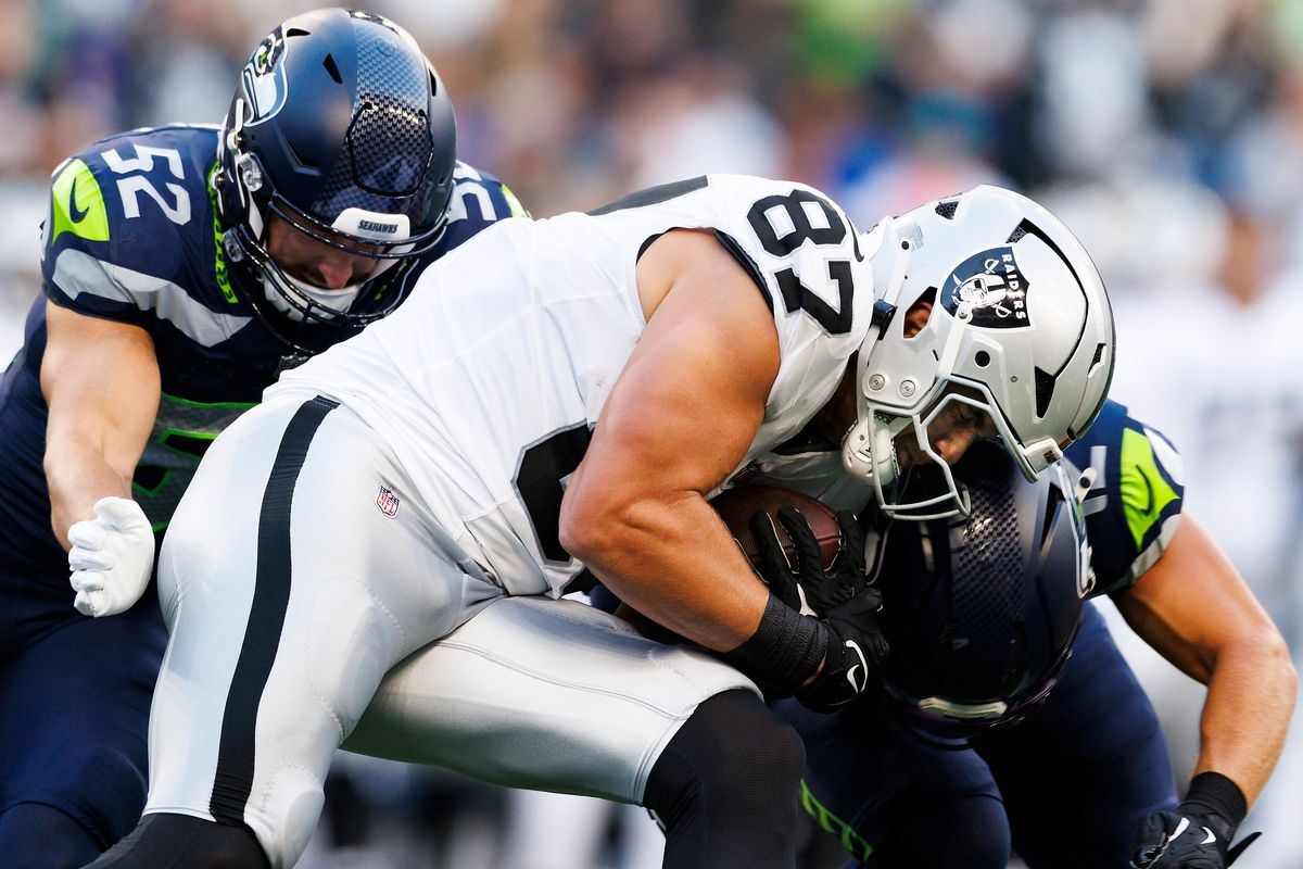 Michael Mayer #87 of the Las Vegas Raiders runs after the catch during the first half against the Seattle Seahawks at Lumen Field on August 7, 2025 in Seattle, Washington.