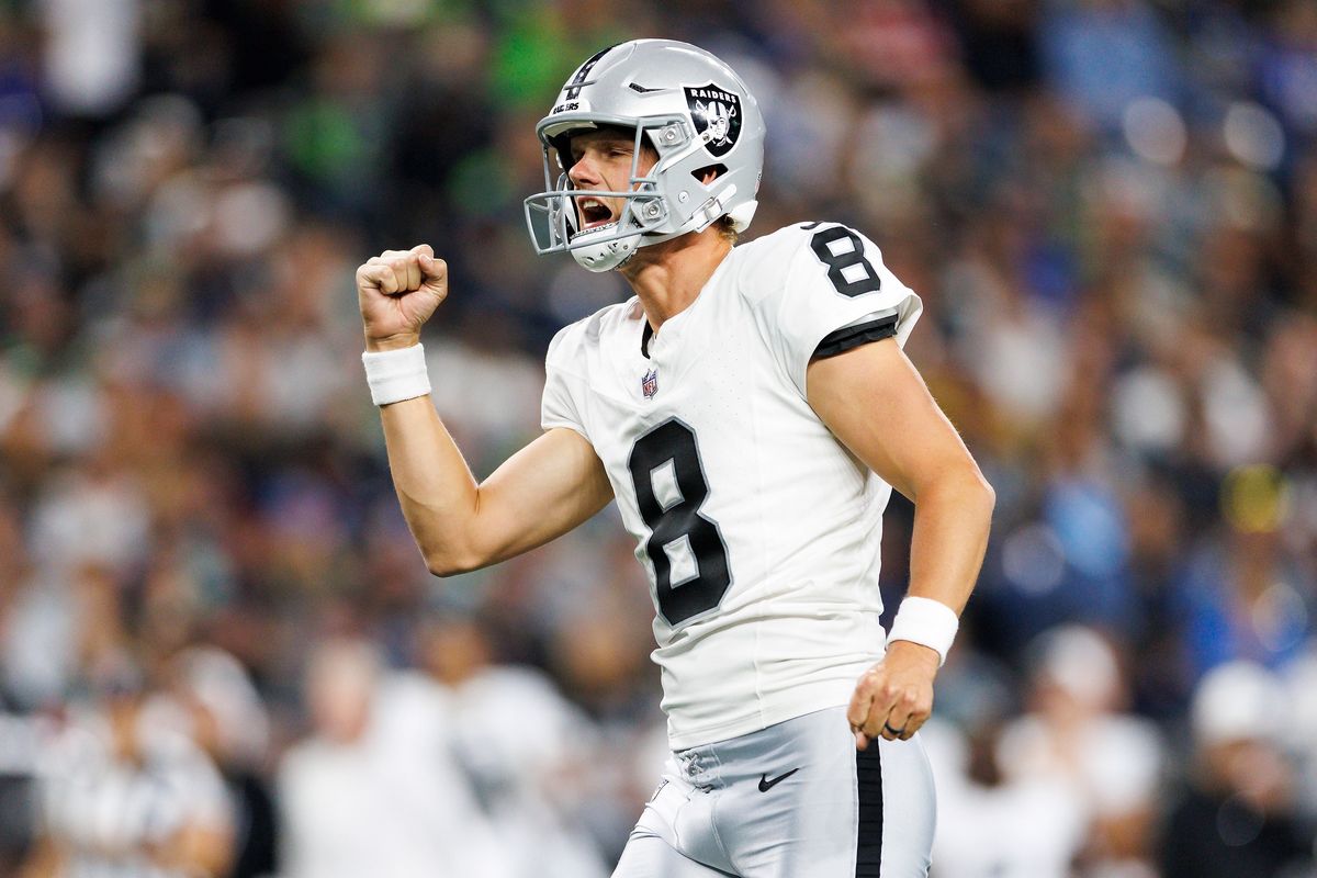 Daniel Carlson #8 of the Las Vegas Raiders celebrates during the second half against the Seattle Seahawks at Lumen Field on August 7, 2025 in Seattle, Washington.