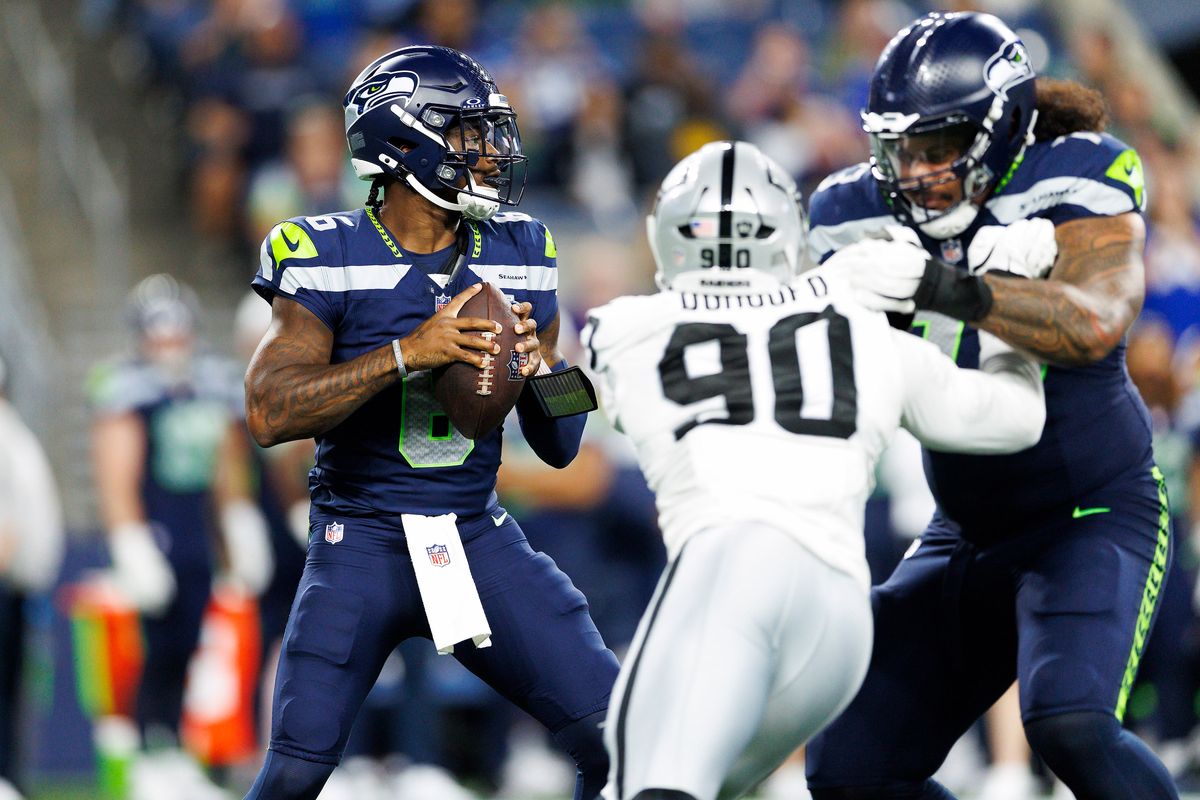 Jalen Milroe #6 of the Seattle Seahawks drops back to pass during the second half against the Seattle Seahawks at Lumen Field on August 7, 2025 in Seattle, Washington.