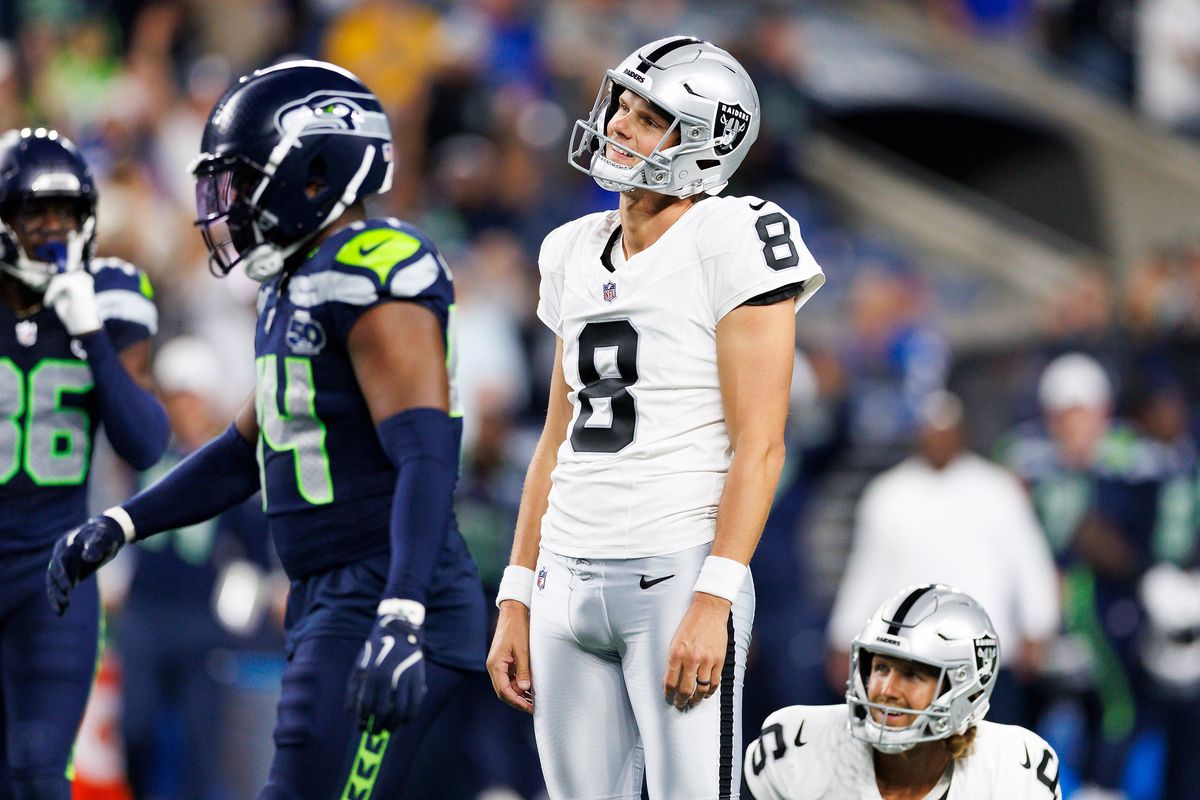 Daniel Carlson #8 of the Las Vegas Raiders reacts to missing a field goal attempt in the fourth quarter against the Seattle Seahawks at Lumen Field on August 7, 2025 in Seattle, Washington. 