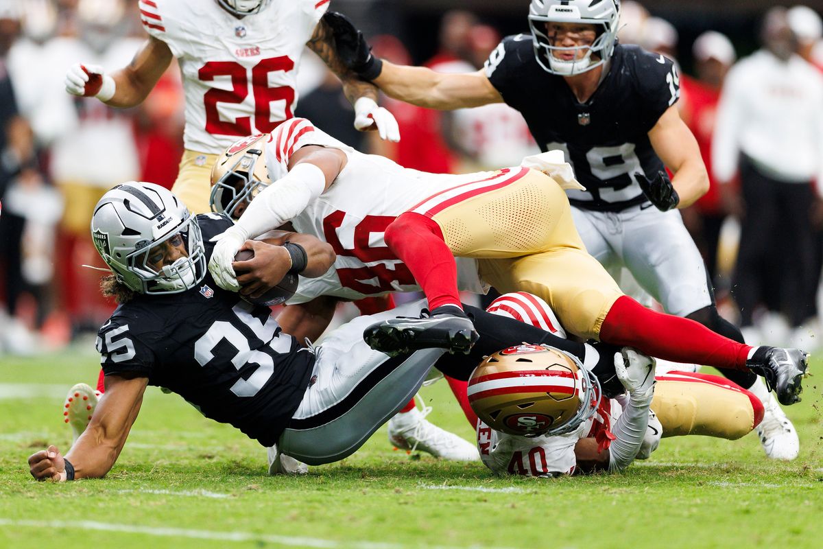 Chazz Surratt #46 of the San Francisco 49ers tackles Chris Collier #35 of the Las Vegas Raiders during the second half at Allegiant Stadium on August 16, 2025 in Las Vegas, Nevada. Chazz Surratt #46 of the San Francisco 49ers tackles Chris Collier #35 of the Las Vegas Raiders during the second half at Allegiant Stadium on August 16, 2025 in Las Vegas, Nevada.