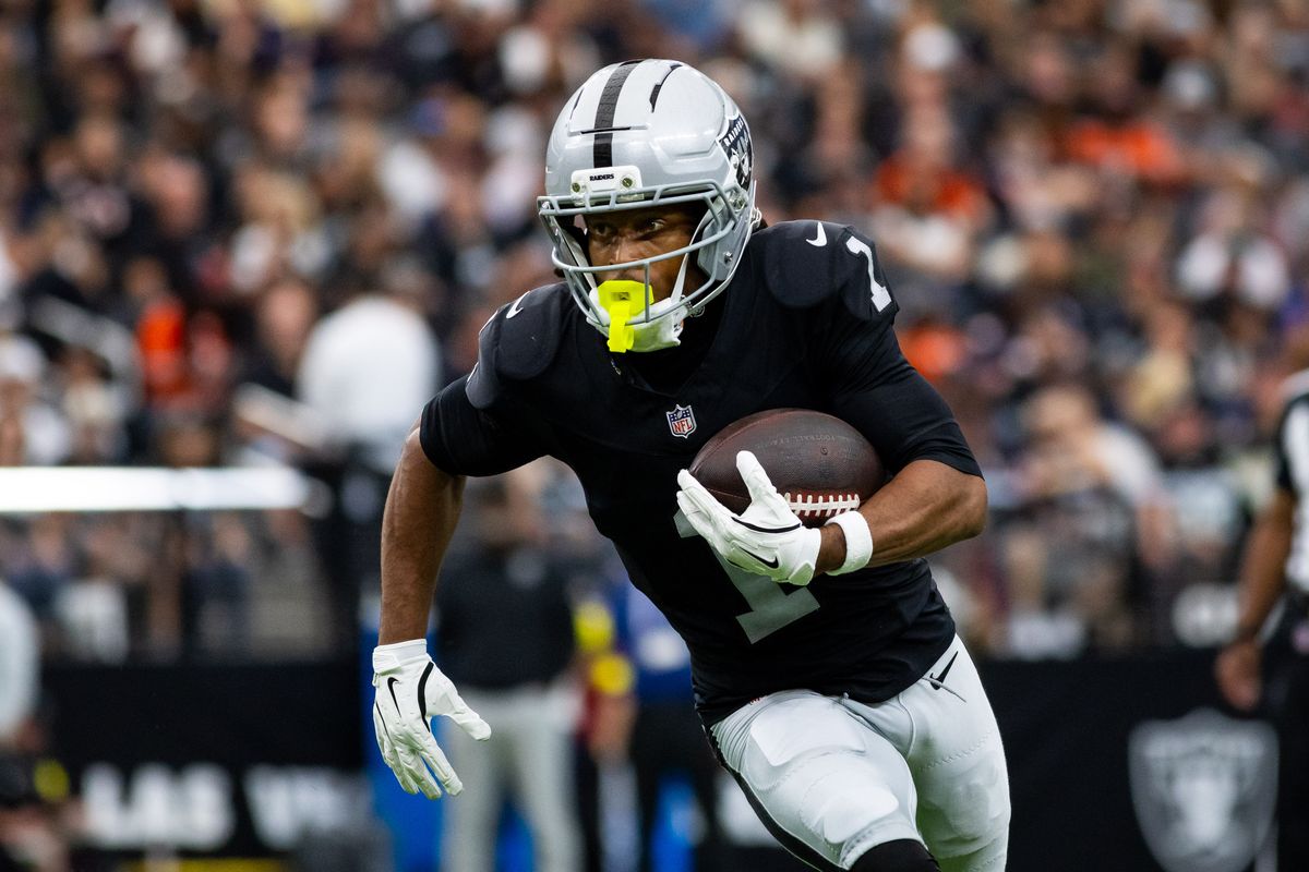 Las Vegas Raiders wide receiver Tre Tucker (1) makes a reception and runs with the ball during a NFL game between the Las Vegas Raiders and the Chicago Bears, Sunday September 28, 2025 in Las Vegas, Nev. Las Vegas Raiders wide receiver Tre Tucker (1) makes a reception and runs with the ball during a NFL game between the Las Vegas Raiders and the Chicago Bears, Sunday September 28, 2025 in Las Vegas, Nev.