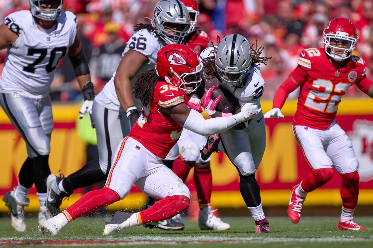 Las Vegas Raiders running back Ashton Jeanty #2 battles with Kansas City Chiefs linebacker Nick Bolton #32 in the second half against the Kansas City Chiefs during an NFL game at Arrowhead Stadium on October 19, 2025 in Kansas City, Missouri. Las Vegas Raiders running back Ashton Jeanty #2 battles with Kansas City Chiefs linebacker Nick Bolton #32 in the second half against the Kansas City Chiefs during an NFL game at Arrowhead Stadium on October 19, 2025 in Kansas City, Missouri.