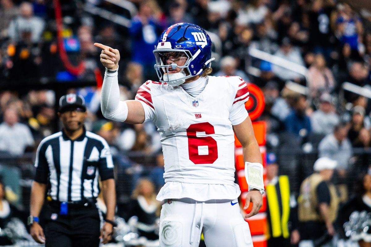 New York Giants quarterback Jaxon Dart (6) celebrates in the endzone after scoring a touchdown during a NFL game between the Las Vegas Raiders and the New York Giants, Sunday December 28, 2025 in Las Vegas, Nev.