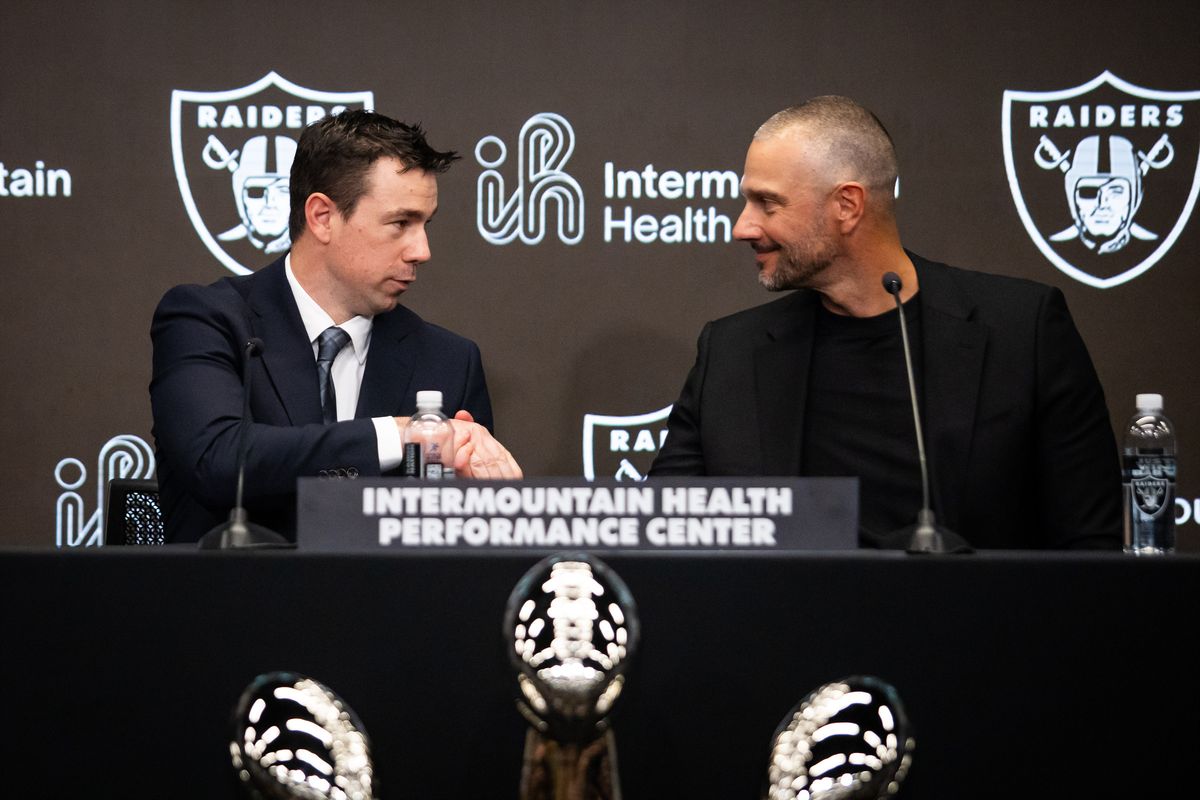 Las Vegas Raiders newly hired head coach Klint Kubiak shakes the hand of Raiders’ general manager John Spytek after a press conference, Tuesday February 10, 2026 in Henderson, Nev. 