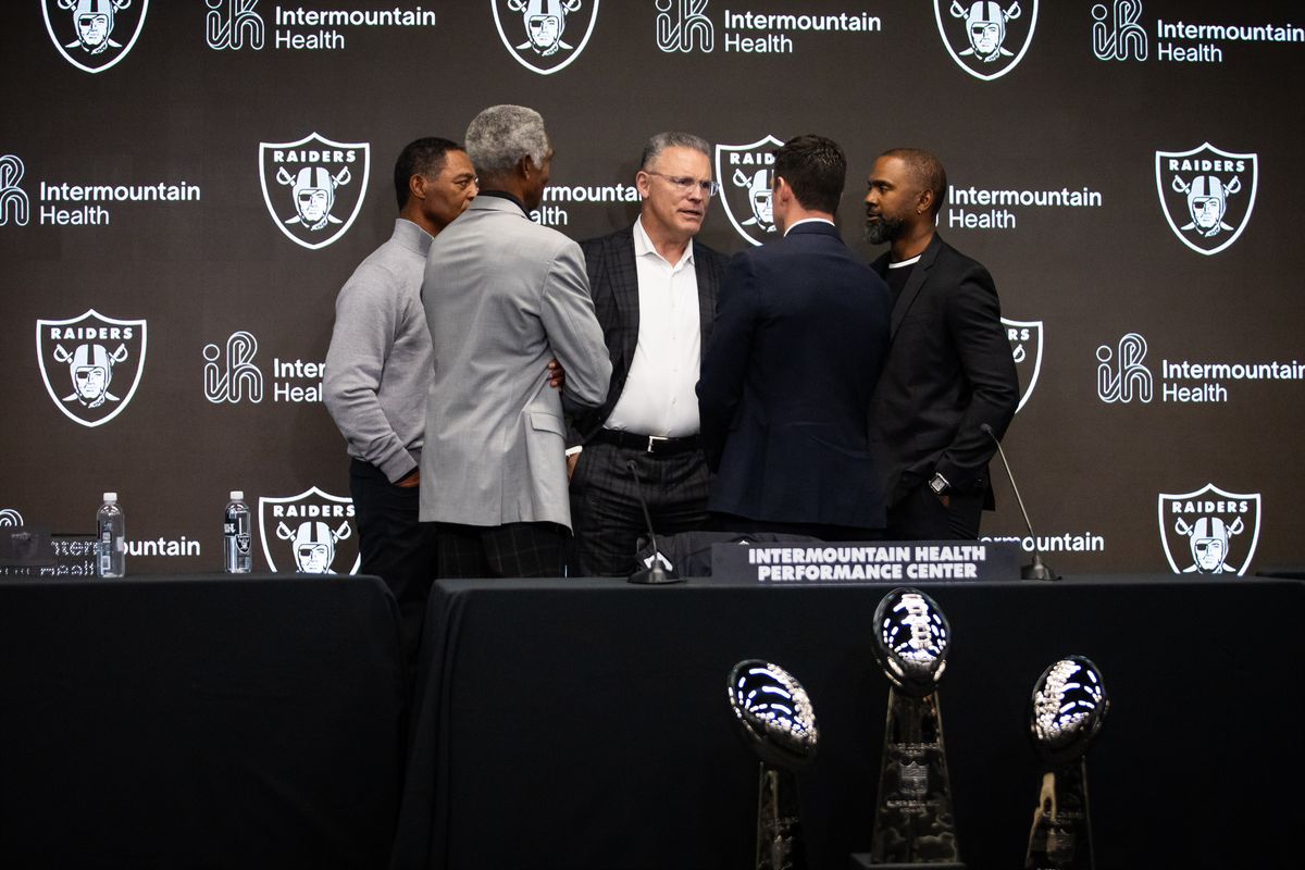 Former Las Vegas Raiders legends speak with newly hired head coach Klint Kubiak after a press conference, Tuesday February 10, 2026 in Henderson, Nev. 