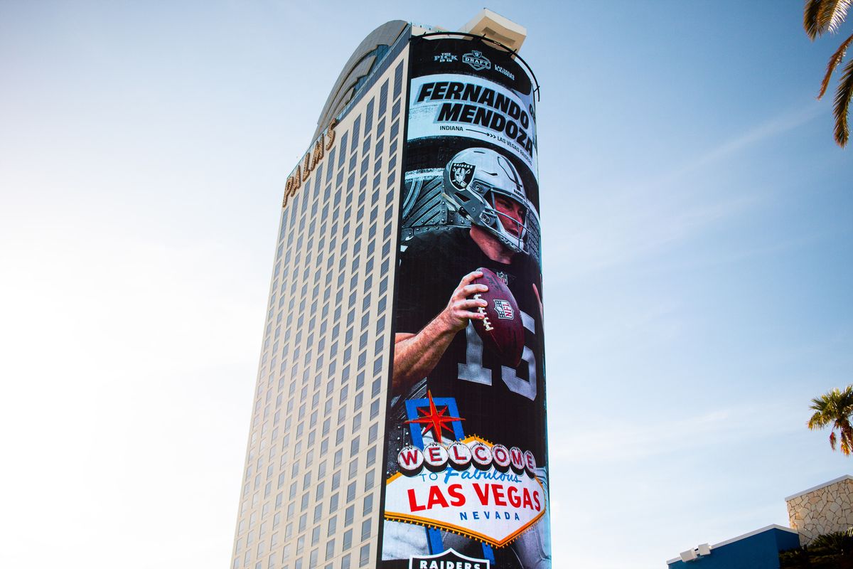 Graphic of No. 1 overall pick Fernando Mendoza in a Las Vegas Raiders uniform displayed on the side of Palms hotel during the Raiders 2026 Draft Party, Thursday April 23, 2026 in Las Vegas, Nev. 