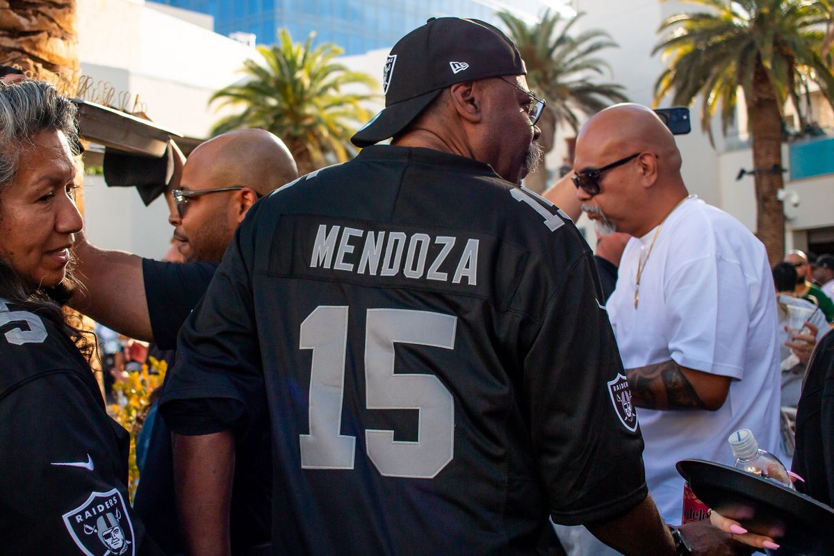 Las Vegas Raiders fan wearing a Fernando Mendoza jersey at the Raiders 2026 Draft Party, Thursday April 23, 2026 in Las Vegas, Nev. 