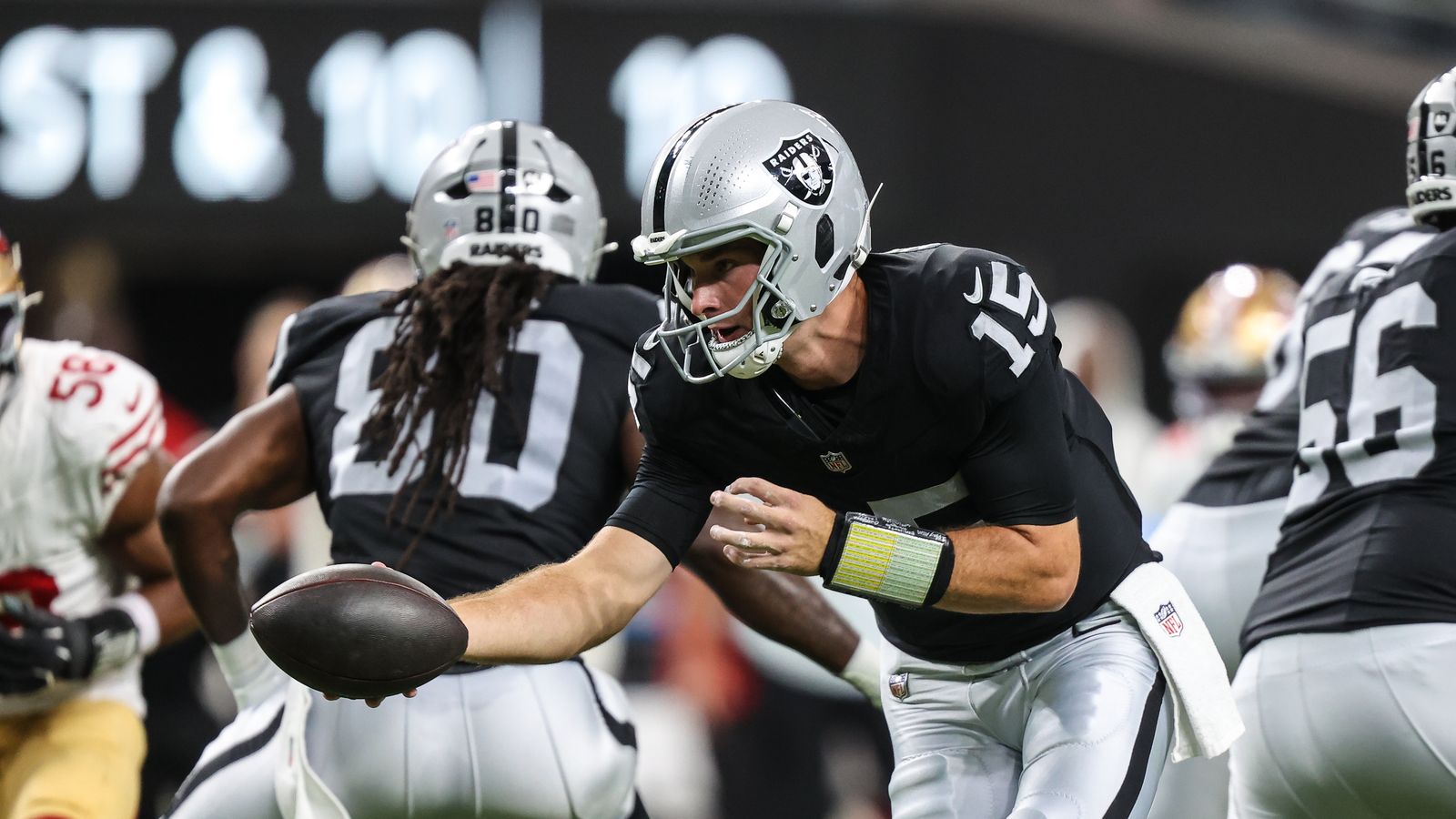 Aug 27, 2026; Paradise, Nevada, USA; Las Vegas Raiders quarterback Fernando Mendoza (15) looks to handoff the ball against the San Francisco 49ers during the first half at Allegiant Stadium. Aug 27, 2026; Paradise, Nevada, USA; Las Vegas Raiders quarterback Fernando Mendoza (15) looks to handoff the ball against the San Francisco 49ers during the first half at Allegiant Stadium.