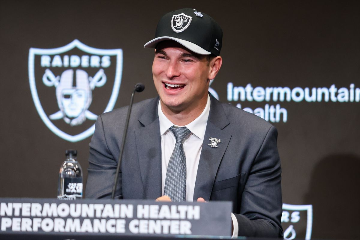 Las Vegas Raiders quarterback Fernando Mendoza smiles while answering a question during a press conference, Friday April 24, 2026 in Henderson, Nev.