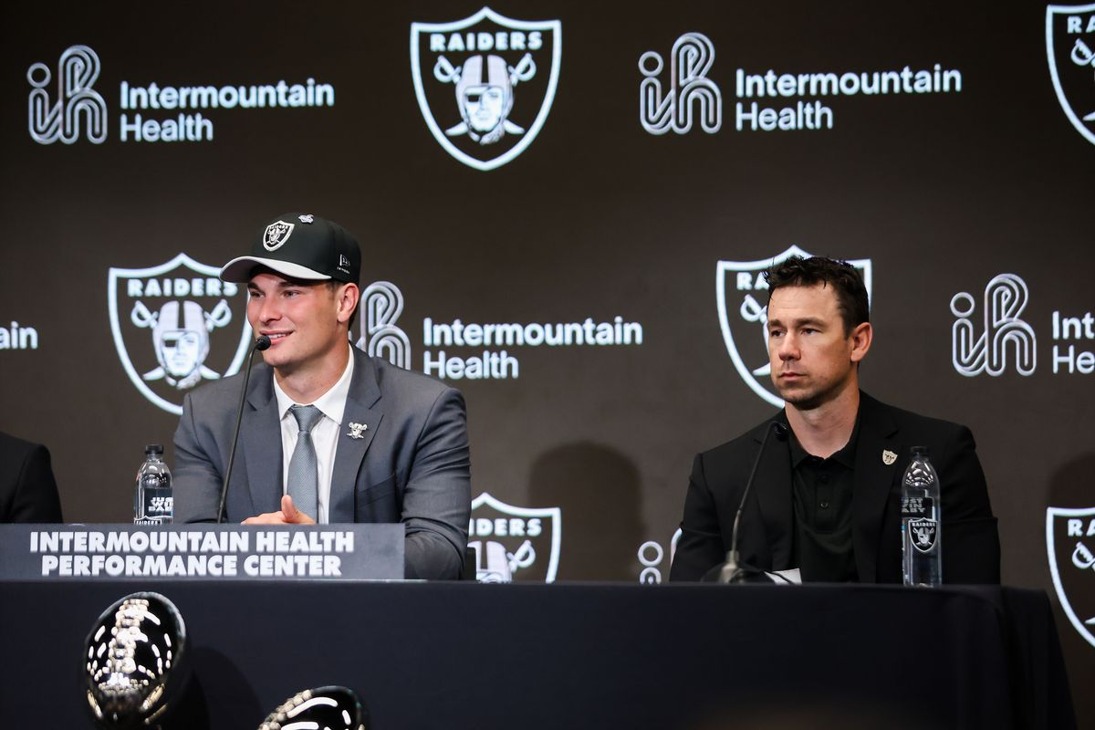 Las Vegas Raiders quarterback Fernando Mendoza and head coach Klint Kubiak listen to a question during a press conference, Friday April 24, 2026 in Henderson, Nev.