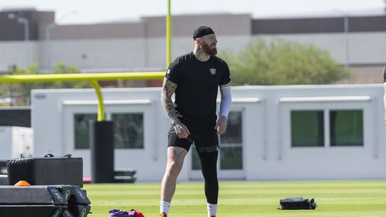 Las Vegas Raiders defensive-end Maxx Crosby stretches alongside the warm up lines during Raiders OTAs at Intermountain Health Performance Center, Wednesday May 20, 2026 in Henderson, Nev.
