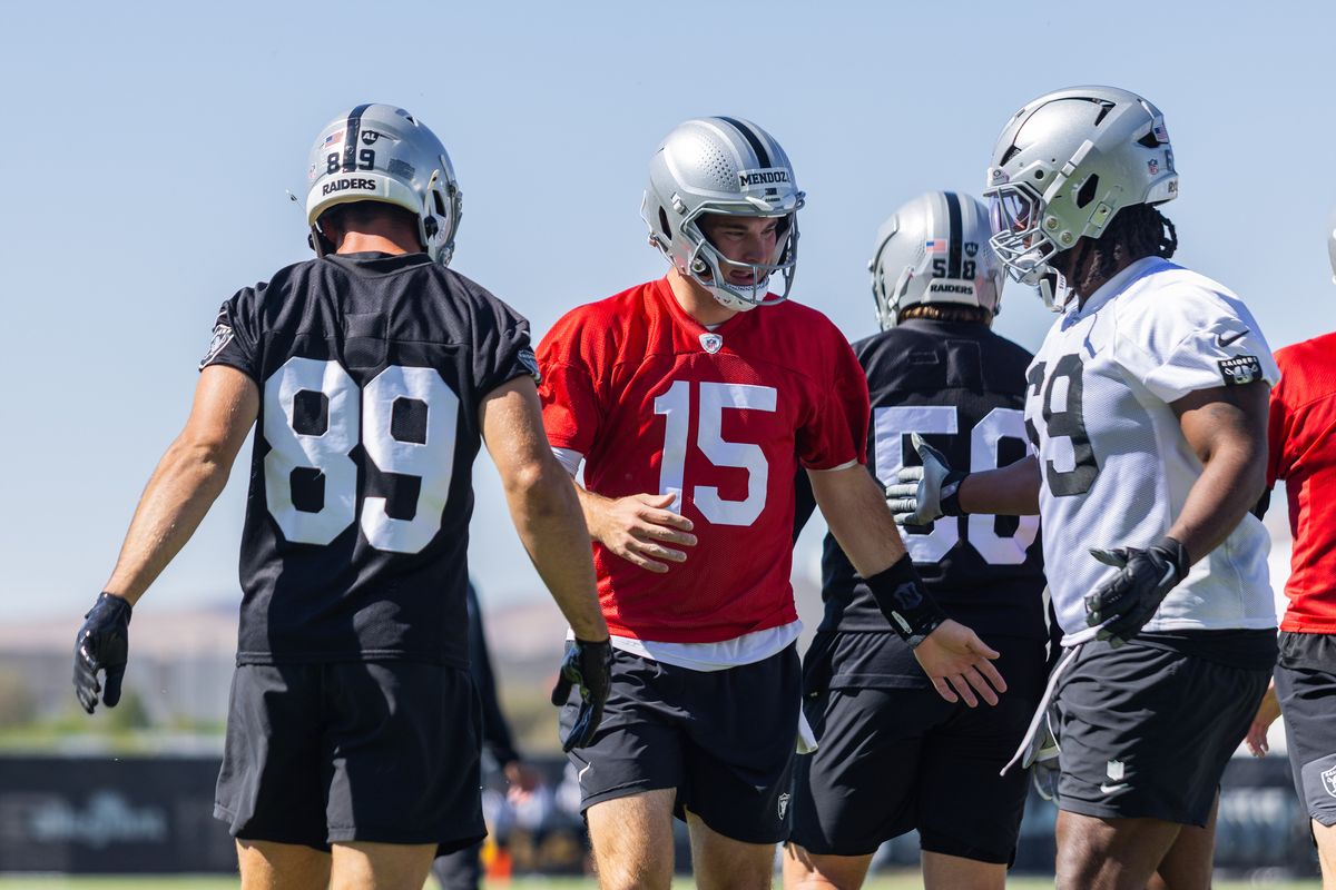 Las Vegas Raiders quarterback Fernando Mendoza (15) high-fives teammates during Raiders OTAs at Intermountain Health Performance Center, Wednesday May 20, 2026 in Henderson, Nev. Las Vegas Raiders quarterback Fernando Mendoza (15) high-fives teammates during Raiders OTAs at Intermountain Health Performance Center, Wednesday May 20, 2026 in Henderson, Nev.