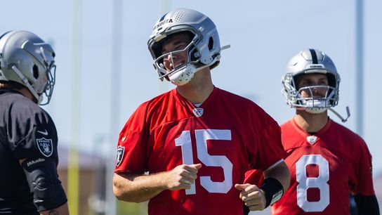 Las Vegas Raiders quarterback Fernando Mendoza (15) smiles while running onto the field during Raiders OTAs at Intermountain Health Performance Center, Thursday May 28, 2026 in Henderson, Nev.