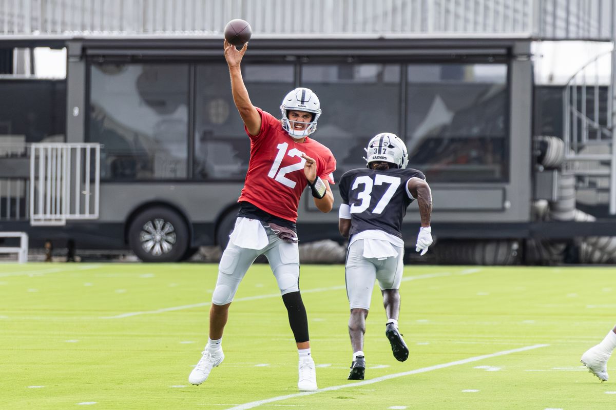 Las Vegas Raiders QB Aidan O'Connell (12) throws the ball during drills on Day 8 of Raiders Training Camp on Friday, August 7, 2026, in Henderson, Nevada. Las Vegas Raiders QB Aidan O'Connell (12) throws the ball during drills on Day 8 of Raiders Training Camp on Friday, August 7, 2026, in Henderson, Nevada.