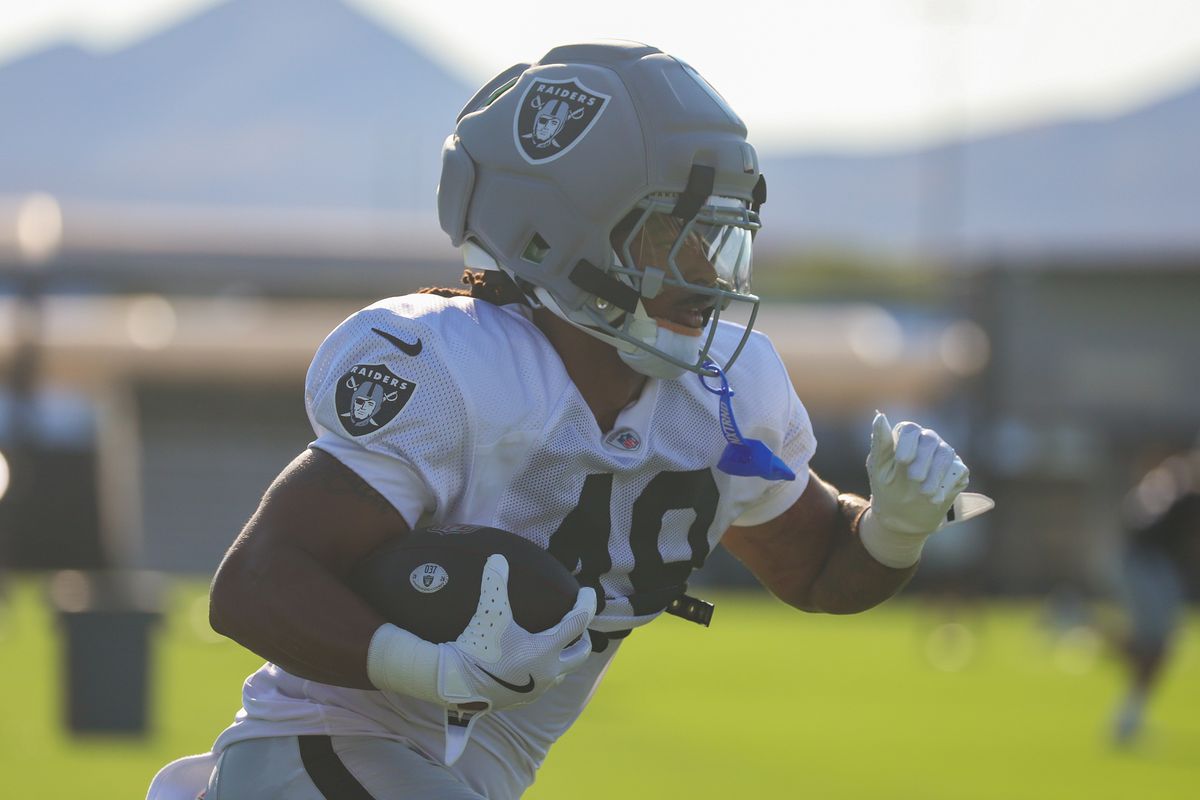 Las Vegas Raiders safety Devyn Perkins (49) runs with the ball during Raiders Training Camp at Intermountain Health Performance Center, Saturday Aug. 8, 2026 in Henderson, Nev. Las Vegas Raiders safety Devyn Perkins (49) runs with the ball during Raiders Training Camp at Intermountain Health Performance Center, Saturday Aug. 8, 2026 in Henderson, Nev.