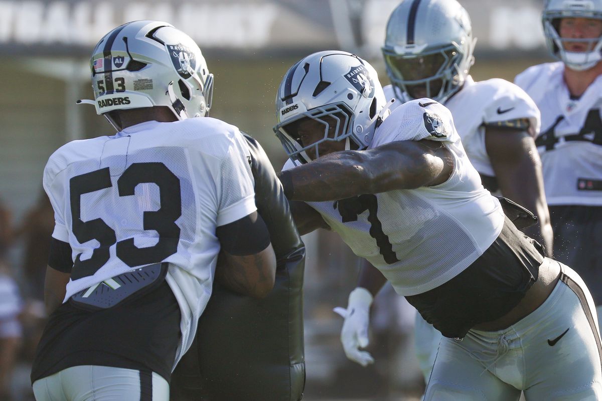 Las Vegas Raiders line backer Quay Walker (7) runs through Xavian Sorey Jr. (53) during Raiders Training Camp at Intermountain Health Performance Center, Saturday Aug. 8, 2026 in Henderson, Nev. Las Vegas Raiders line backer Quay Walker (7) runs through Xavian Sorey Jr. (53) during Raiders Training Camp at Intermountain Health Performance Center, Saturday Aug. 8, 2026 in Henderson, Nev.