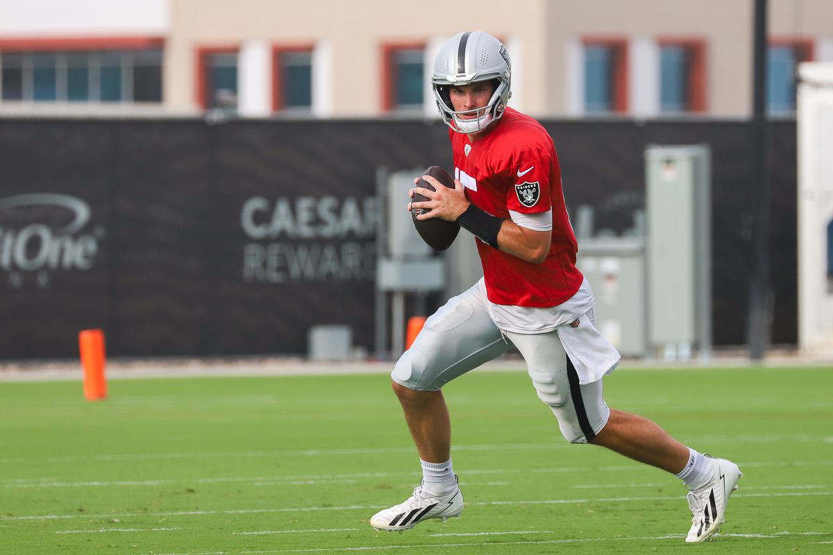 Las Vegas Raiders quarterback Fernando Mendoza (15) runs with the ball during Raiders Training Camp at Intermountain Health Performance Center, Monday Aug. 10, 2026 in Henderson, Nev. Las Vegas Raiders quarterback Fernando Mendoza (15) runs with the ball during Raiders Training Camp at Intermountain Health Performance Center, Monday Aug. 10, 2026 in Henderson, Nev.