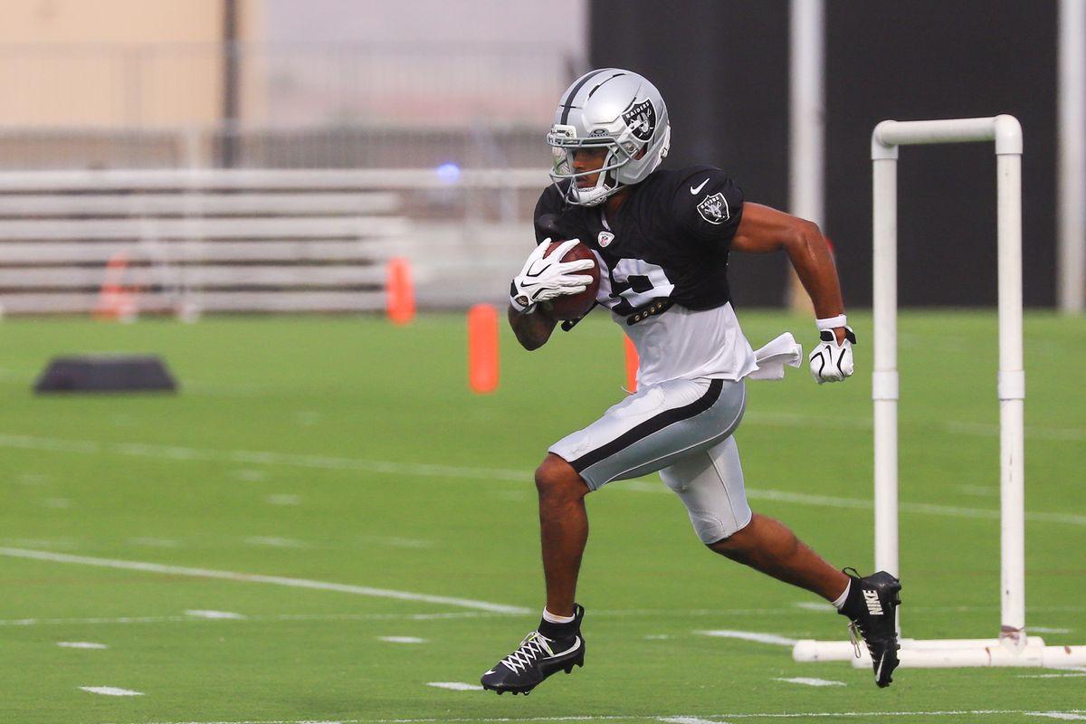 Las Vegas Raiders running back Mike Washington Jr. (30) runs with the ball during Raiders Training Camp at Intermountain Health Performance Center, Monday Aug. 10, 2026 in Henderson, Nev. Las Vegas Raiders running back Mike Washington Jr. (30) runs with the ball during Raiders Training Camp at Intermountain Health Performance Center, Monday Aug. 10, 2026 in Henderson, Nev.