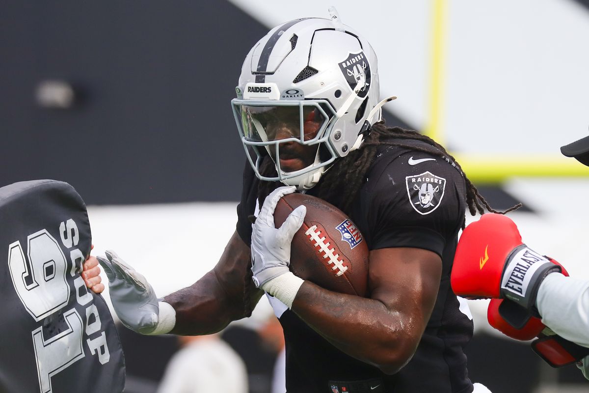 Las Vegas Raiders tight end Ian Thomas (80) attempts to carry the ball through the drill while during Raiders Training Camp at Intermountain Health Performance Center, Monday Aug. 10, 2026 in Henderson, Nev. Las Vegas Raiders tight end Ian Thomas (80) attempts to carry the ball through the drill while during Raiders Training Camp at Intermountain Health Performance Center, Monday Aug. 10, 2026 in Henderson, Nev.