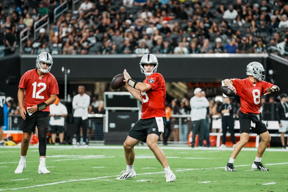 Las Vegas Raiders quarterbacks Aidan O’Connell (12), Fernando Mendoza (15) and Kirk Cousins (8) complete drills during Raiders practice at Allegiant Stadium, Tuesday Aug. 11, 2026 in Las Vegas, Nev. Las Vegas Raiders quarterbacks Aidan O’Connell (12), Fernando Mendoza (15) and Kirk Cousins (8) complete drills during Raiders practice at Allegiant Stadium, Tuesday Aug. 11, 2026 in Las Vegas, Nev.