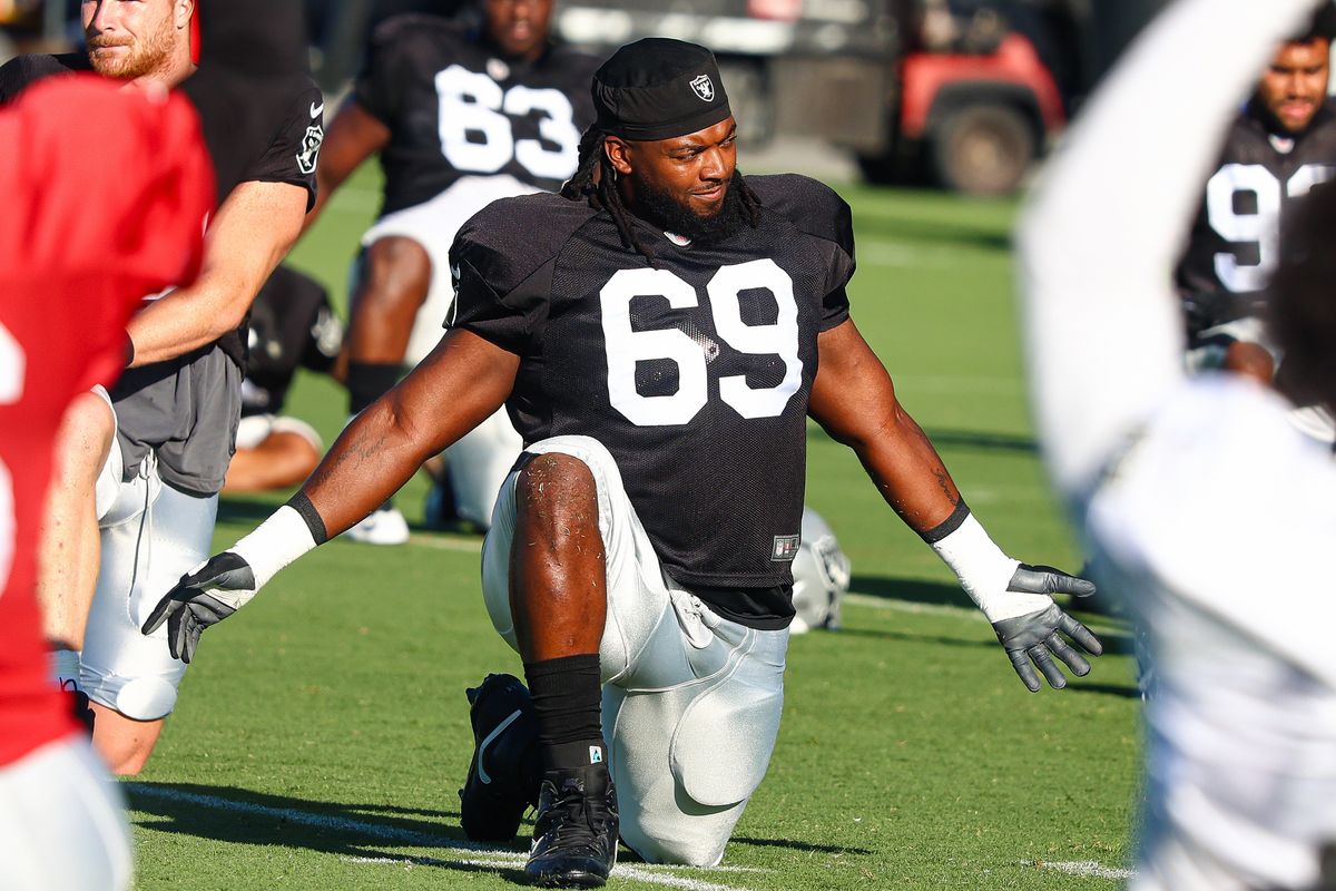 Las Vegas Raiders DT Adam Butler (69) stretches prior to Day 13 of Raiders Training Camp at Intermountain Health Performance Center on Sunday, August 16, 2026, in Henderson, Nevada. Las Vegas Raiders DT Adam Butler (69) stretches prior to Day 13 of Raiders Training Camp at Intermountain Health Performance Center on Sunday, August 16, 2026, in Henderson, Nevada.