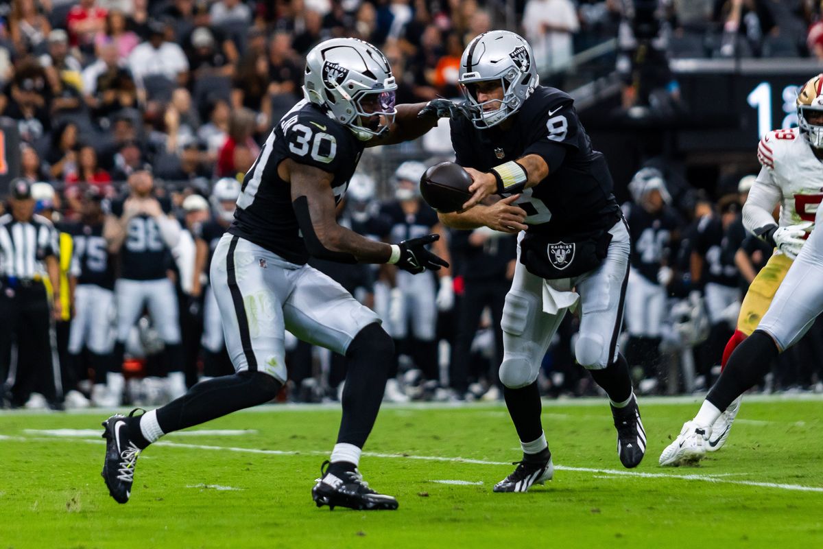 Las Vegas Raiders quarterback Kirk Cousins (8) hands the ball off to running back Mike Washington Jr. (30) during a NFL preseason game between the Las Vegas Raiders and the San Francisco 49ers at Allegiant Stadium, Thursday August 27, 2026 in Las Vegas, Nev. Las Vegas Raiders quarterback Kirk Cousins (8) hands the ball off to running back Mike Washington Jr. (30) during a NFL preseason game between the Las Vegas Raiders and the San Francisco 49ers at Allegiant Stadium, Thursday August 27, 2026 in Las Vegas, Nev.