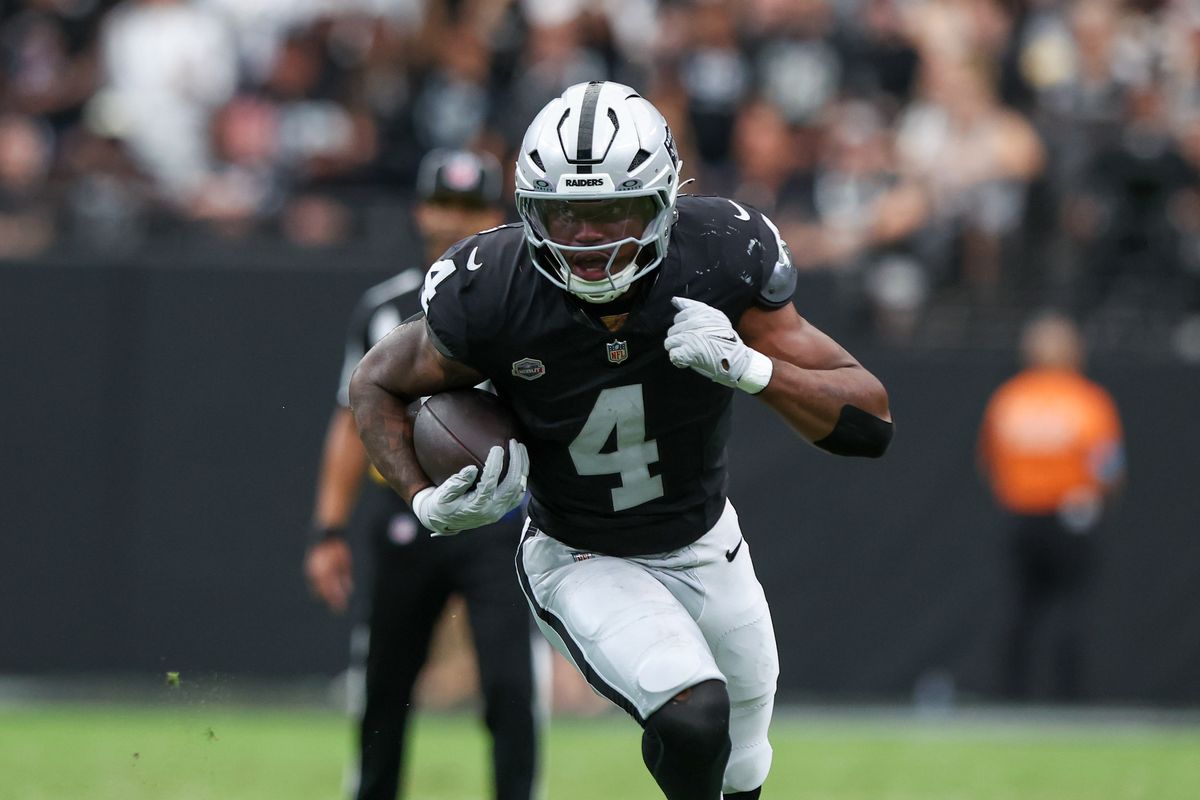 Las Vegas Raiders running back Mike Washington Jr. (4) runs the ball for a gain during a NFL regular season game between the Las Vegas Raiders and Miami Dolphins at Allegiant Stadium, Sunday September 13, 2026 in Las Vegas, NV. Las Vegas Raiders running back Mike Washington Jr. (4) runs the ball for a gain during a NFL regular season game between the Las Vegas Raiders and Miami Dolphins at Allegiant Stadium, Sunday September 13, 2026 in Las Vegas, NV.