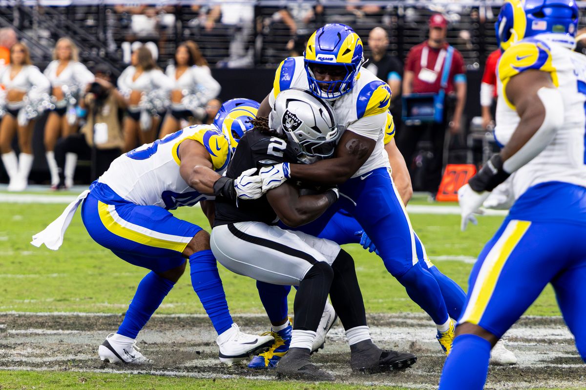 Las Vegas Raiders RB Ashton Jeanty (2) is tackled in the second quarter of the game against the Los Angeles Rams on Sunday, October 25, 2026, at Allegiant Stadium in Las Vegas, Nevada.