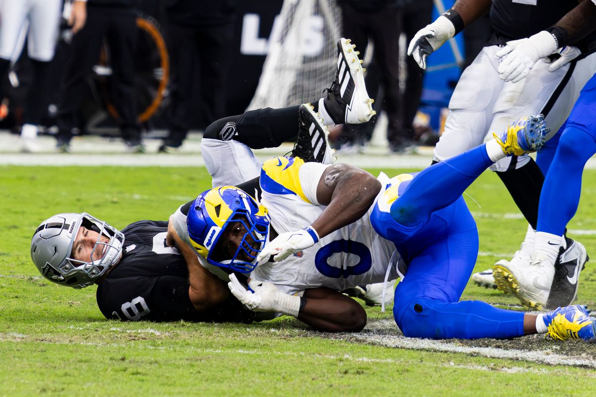 Los Angeles Rams OLB Byron Young (0) sacks Las Vegas Raiders QB Kirk Cousins (8) in the second quarter of the game on Sunday, October 25, 2026, at Allegiant Stadium in Las Vegas, Nevada.