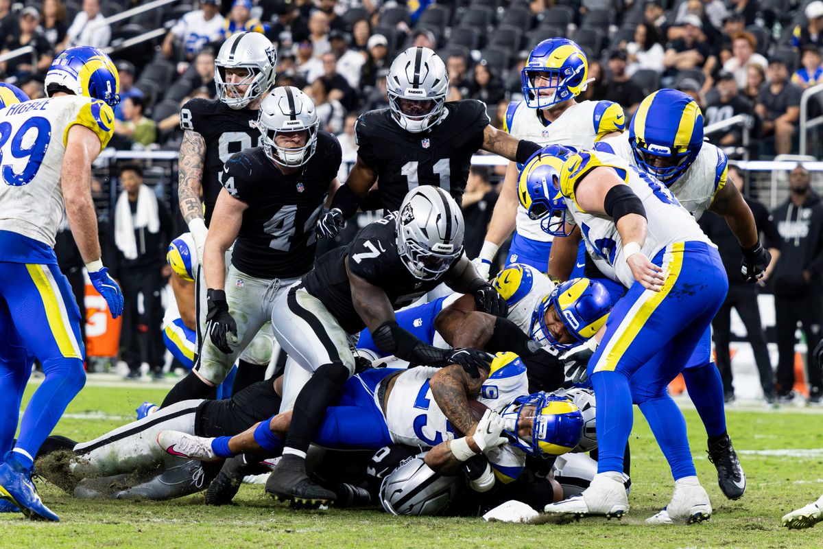 Los Angeles Rams RB Kyren Williams (23) is tackled on a rushing attempt in the fourth quarter of the game against the Las Vegas Raiders on Sunday, October 25, 2026, at Allegiant Stadium in Las Vegas, Nevada.