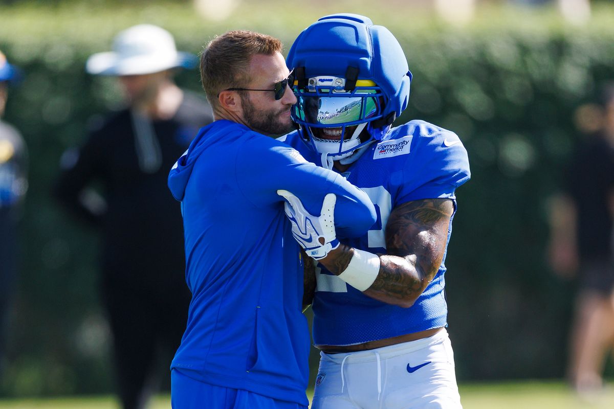 Sean McVay of the Los Angeles Rams hugs Kyren Williams #23 of the Los Angeles Rams during training camp at Loyola Marymount University on August 1, 2026 in Los Angeles, California. Sean McVay of the Los Angeles Rams hugs Kyren Williams #23 of the Los Angeles Rams during training camp at Loyola Marymount University on August 1, 2026 in Los Angeles, California.
