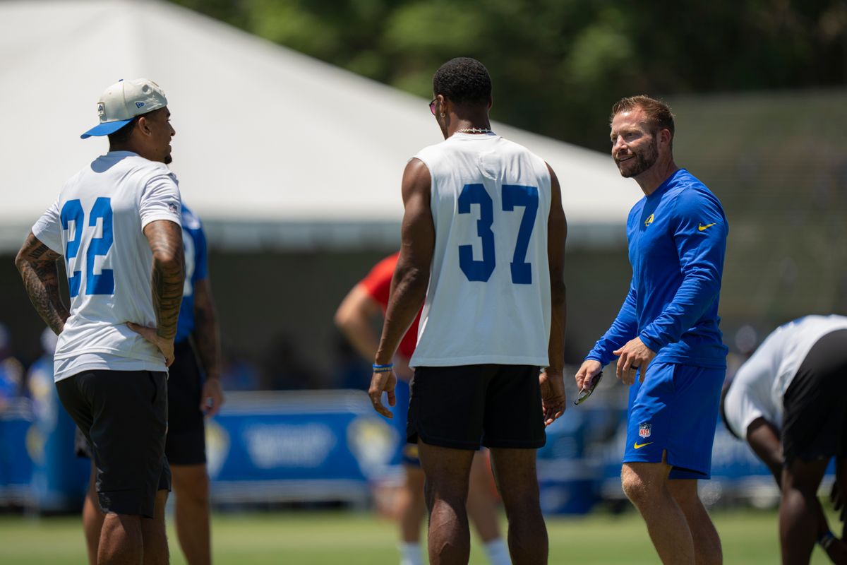 Sean McVay of the Los Angeles Rams talking with Trent Mcduffie #22, and Quentin Lake #37 during Rams training camp at Loyola Marymount University on Sunday, August 2nd in Westchester, CA.