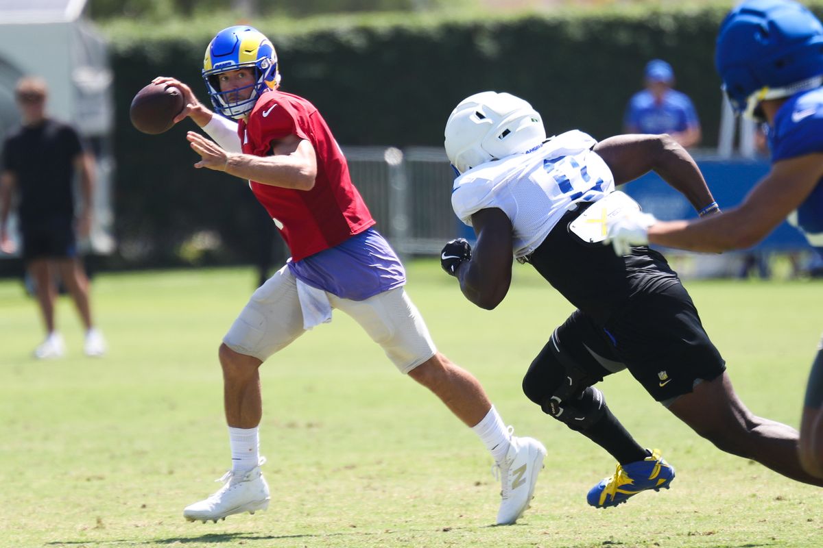 Matthew Stafford #9 of the Los Angeles Rams rolls out of the pocket during Rams training camp at Loyola Marymount University on Mondday, August 3, 2026 in Westchester, CA. Matthew Stafford #9 of the Los Angeles Rams rolls out of the pocket during Rams training camp at Loyola Marymount University on Mondday, August 3, 2026 in Westchester, CA.