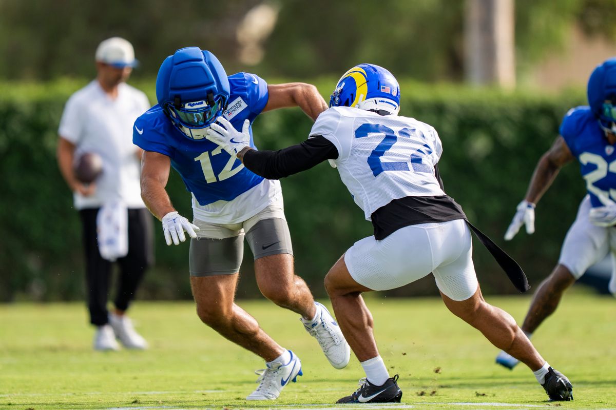 Puka Nacua #12 running a route against Trent McDuffie #22 of the Los Angeles Rams during Rams training camp at Loyola Marymount University on Wednesday, August 5th in Westchester, CA.
